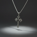 Silver cross pendant necklace on a dark background