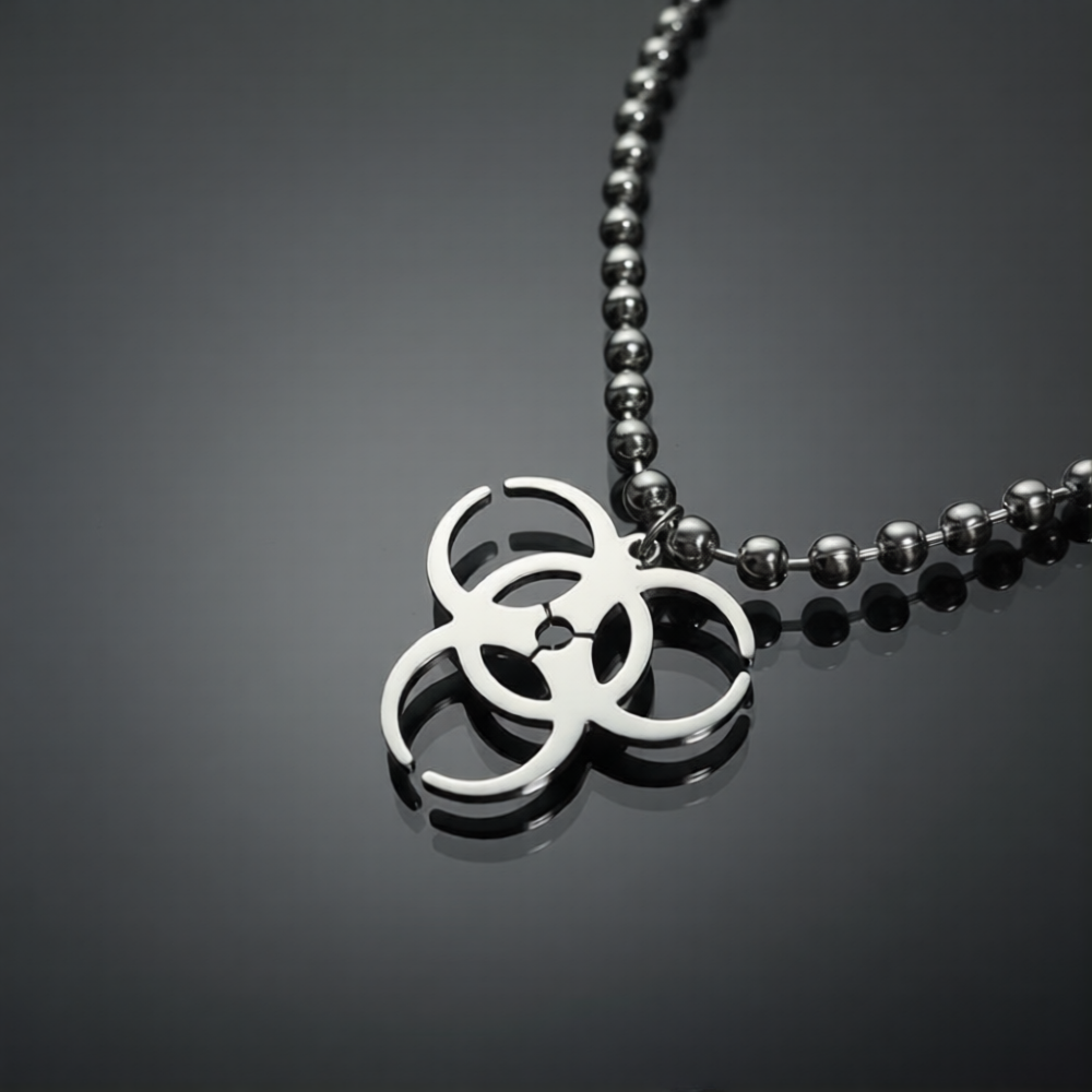 Silver necklace with a unique pendant on a dark gray background
