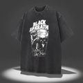 Black t-shirt with Black Sabbath graphic design on a dark background